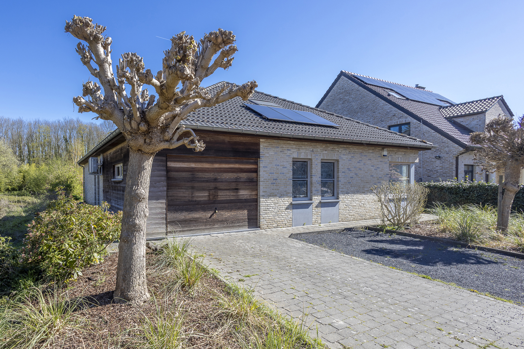 Ruime gezinswoning met prachtige tuin in centrum Dilbeek - foto 2