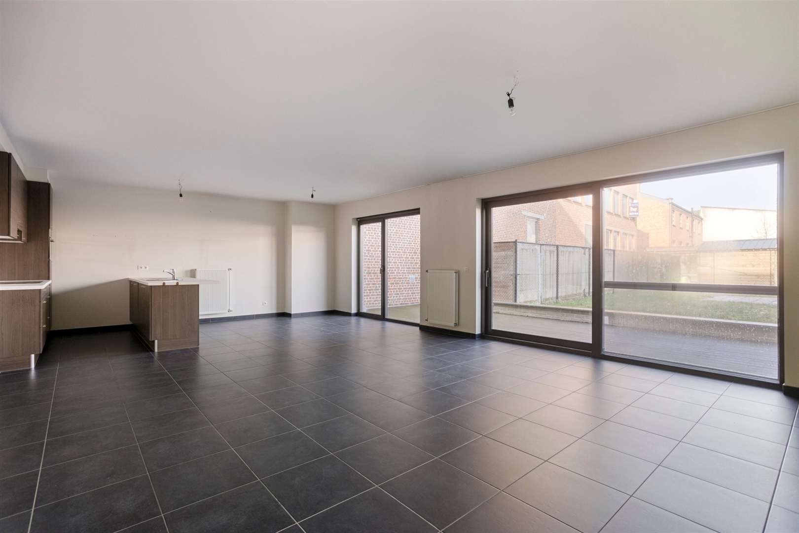 Riant appartement met grote tuin en 2 slpks - foto 5