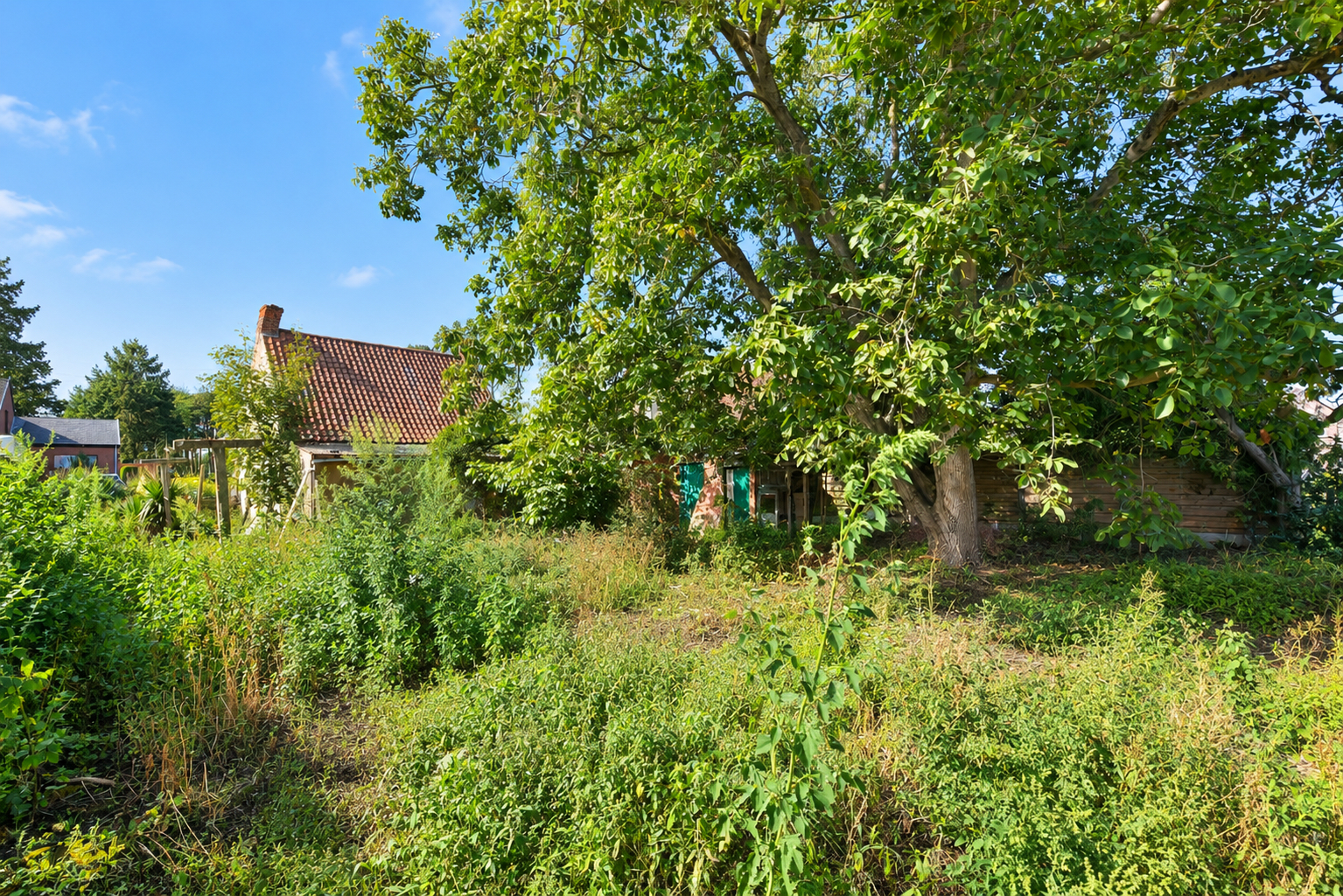 Uitstekend gelegen perceel grond met garage en tuin voor 199.000 EUR - foto 5
