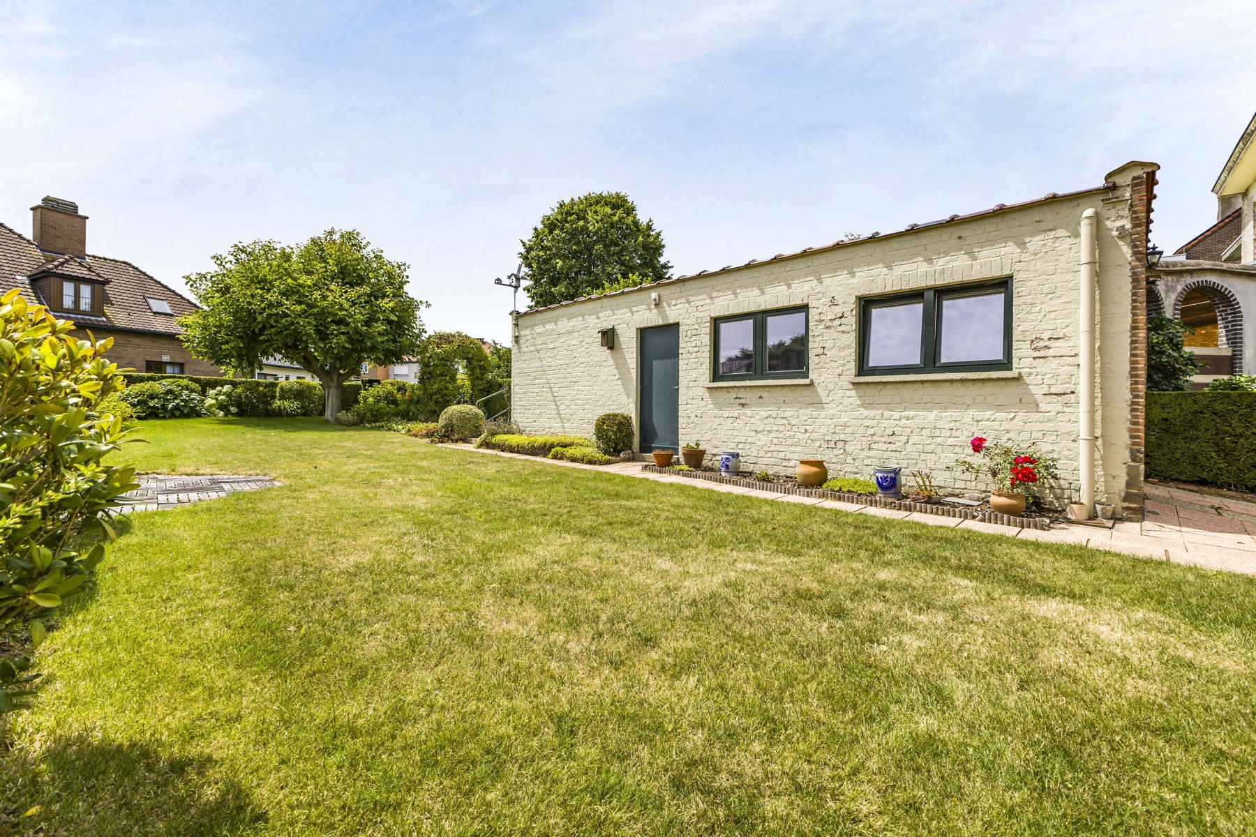 Goed onderhouden woning met garage en leuke tuin - foto 5
