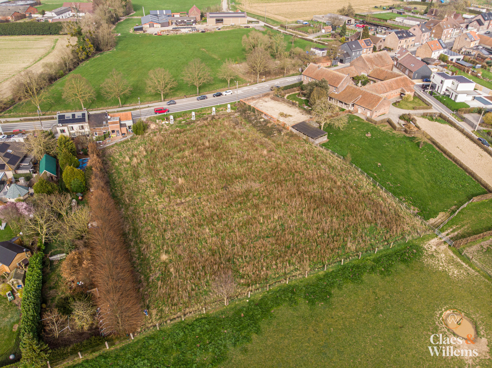 Bouwgrond voor een driegevelwoning met zuidgerichte tuin en open zicht op de velden. - foto 2