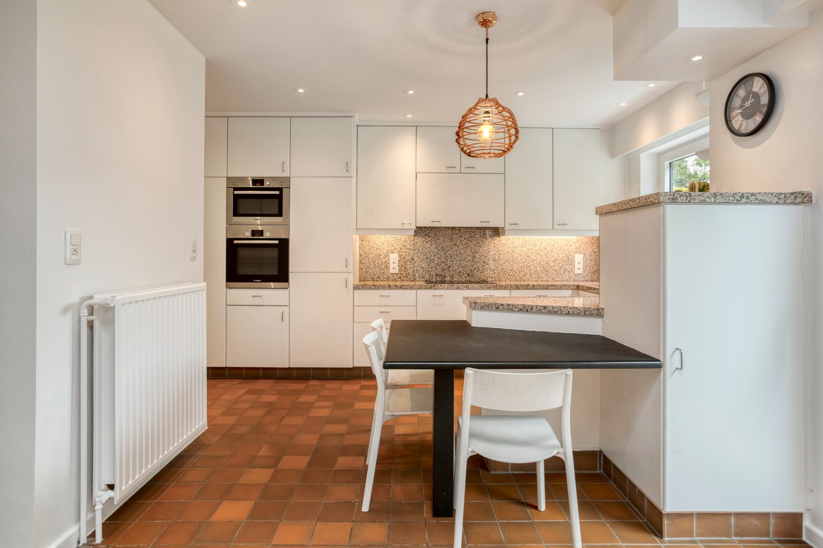 Gerenoveerde halfopen bebouwing met 4 slaapkamers, bureau en tuin in centrum Brasschaat - foto 5