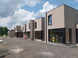 VERKOOP AAN 6% BTW mogelijk onder voorwaarden !Nieuwbouwproject van 5 ruime, moderne woningen met plat dak nabij het Centrum van Mol.Deze woningen...