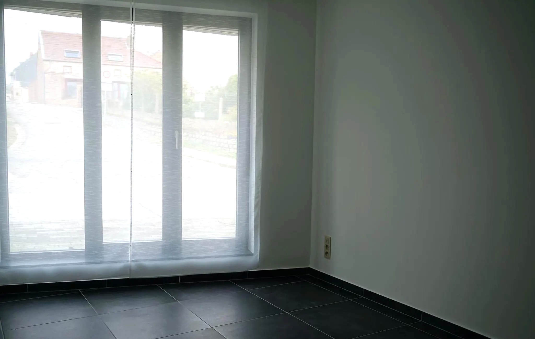 Gelijkvloers appartement met tuin en staanplaats - foto 5