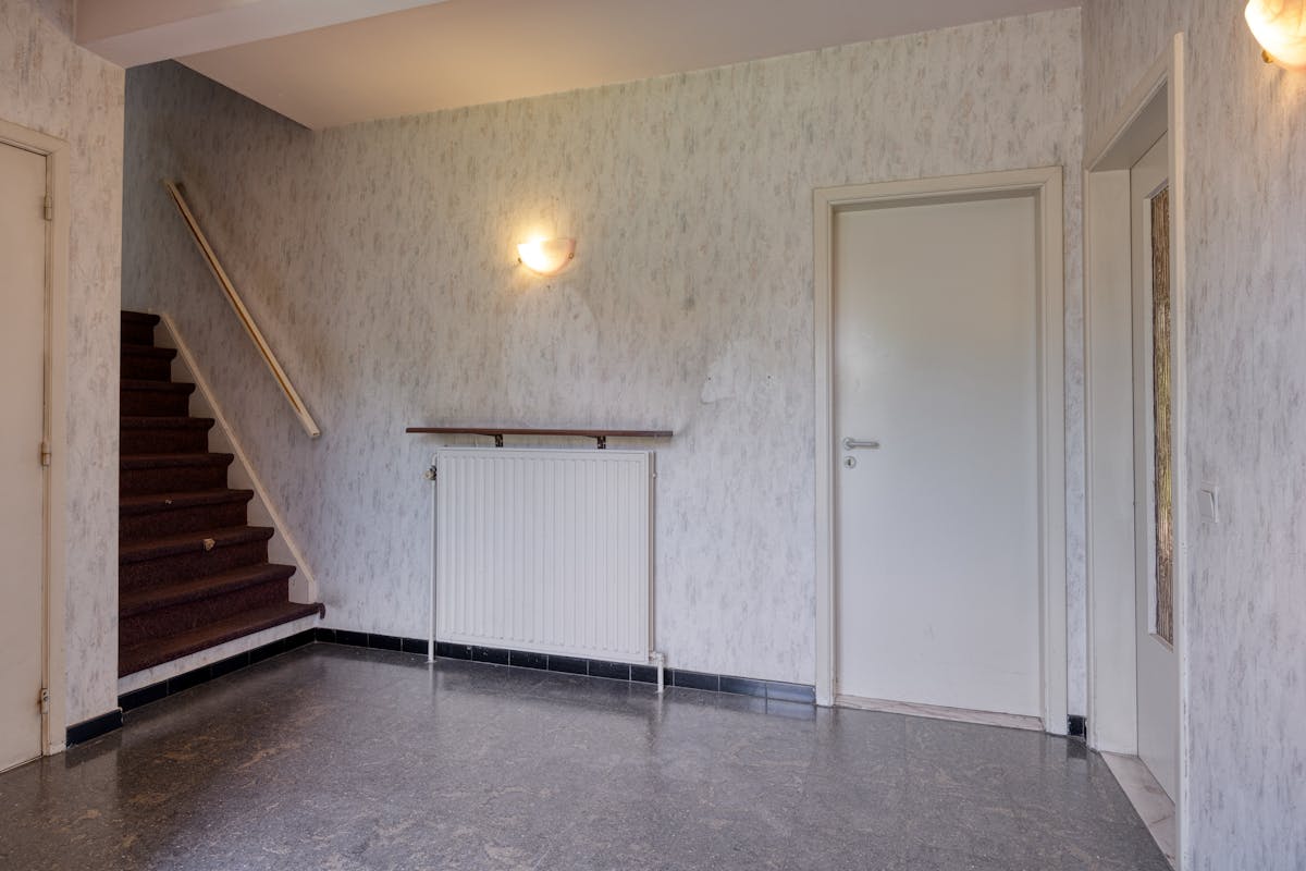 Te renoveren woning met grote tuin in Heide-Kalmthout! - foto 4