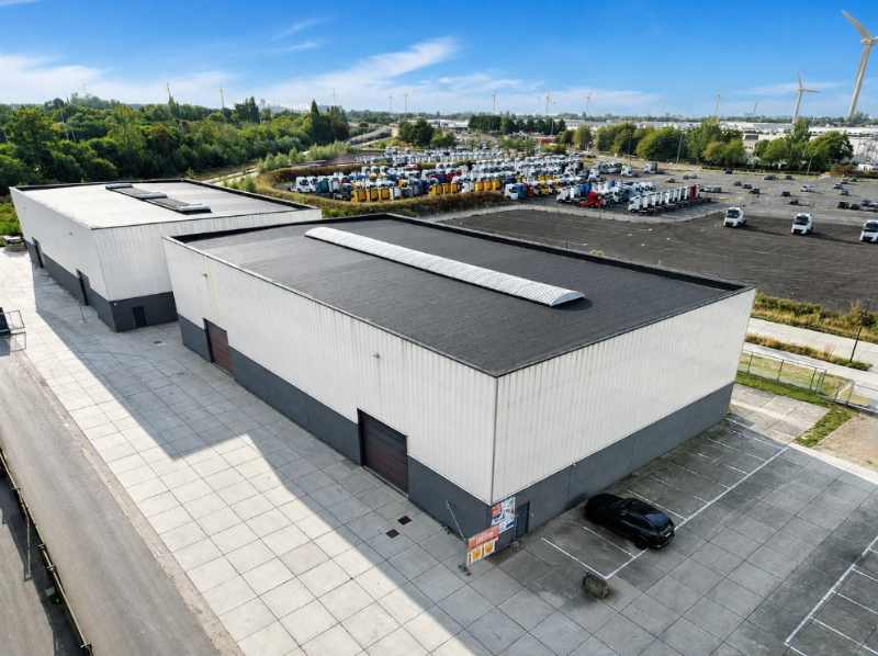 Recent magazijn van 1.062 m² met 2 sectionaalpoorten op toplocatie in Oostakker - foto 1
