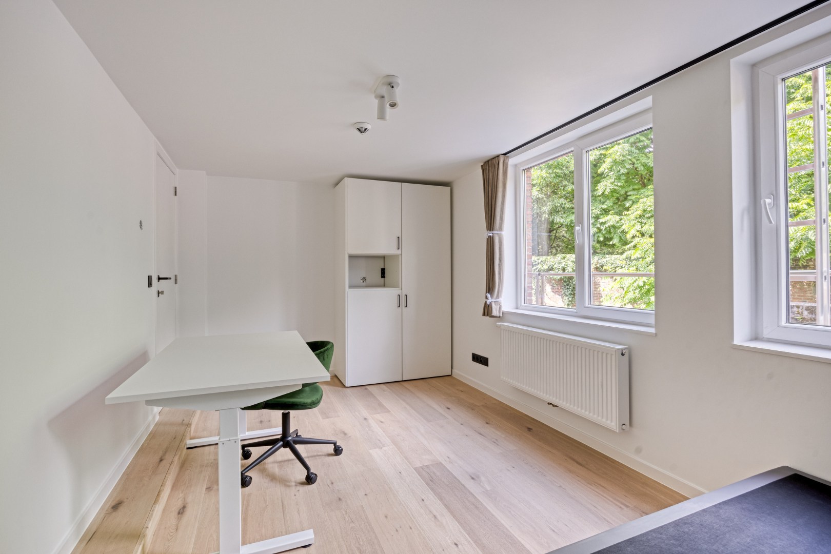 Volledig gerenoveerde studentenkamer in residentie met 29 studentenkamers met eigen sanitair en terras in hartje Leuven - EPC label A! - foto 2