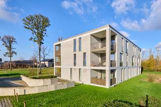 Energiezuinig appartement met zonnepanelen, 2 slaapkamers, zuidgericht terras en ondergrondse parking op een rustige locatie in Diepenbeek...