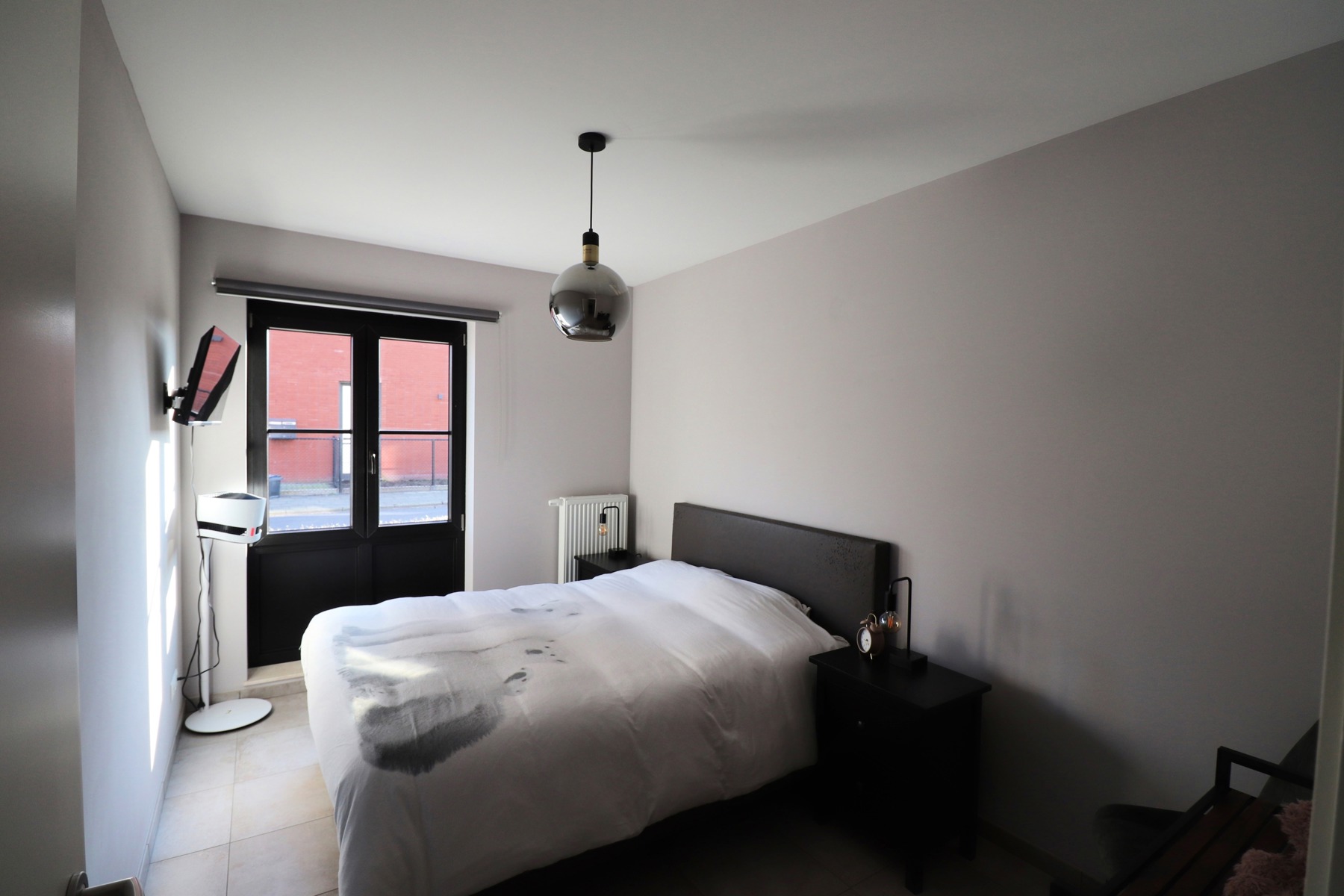 Energiezuinig gelijkvloers appartement met 2 slaapkamers, autostaanplaats en kelderberging. - foto 5