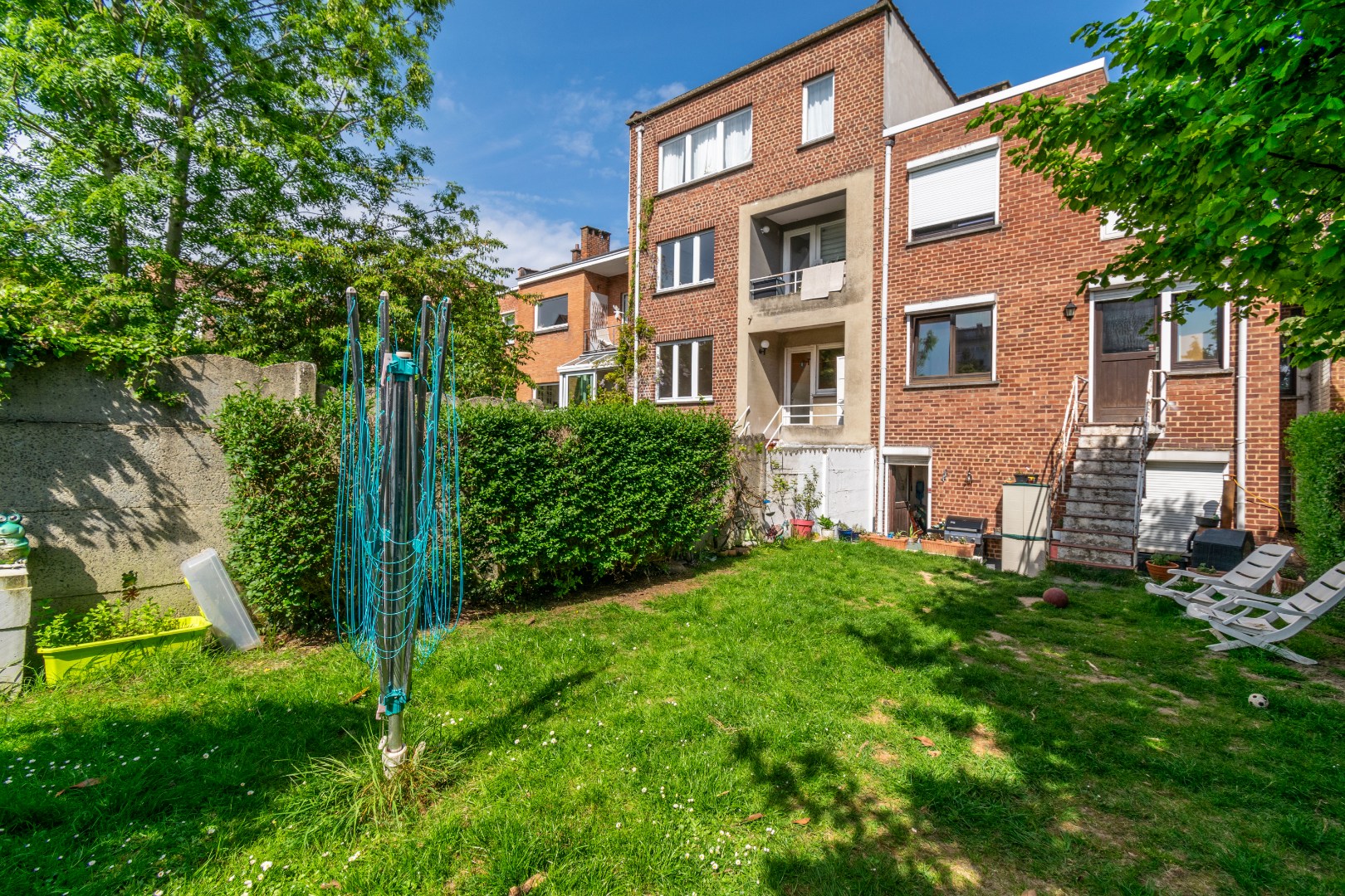 Een opbrengsteigendom bestaande uit 2 appartementen, garage en tuin. - foto 4