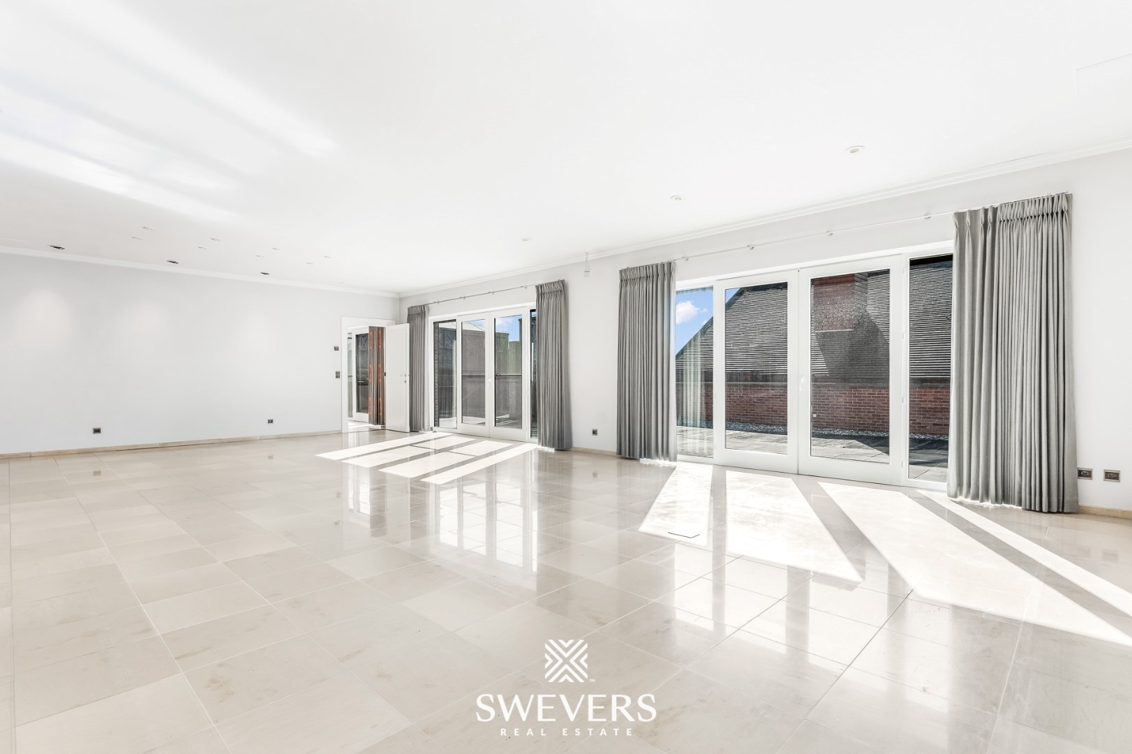 Exclusief luxueus appartement met gigantisch terras en binnentuin gelegen in hartje Lummen ( 408 m2 ) - foto 2