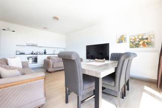 EVERE, NATO area, flat of ± 100m² with terrace of ± 4m² on the 4th floor. In good general condition, it consists of an entrance hall with...