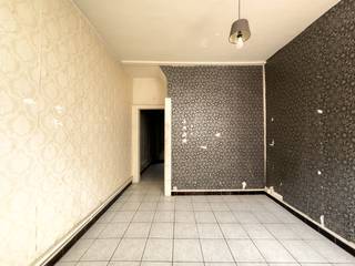 Bent u op zoek naar een betaalbare woning met potentieel? Deze rijwoning in de Kasterstraat biedt een uitstekende kans voor starters, investeerders...