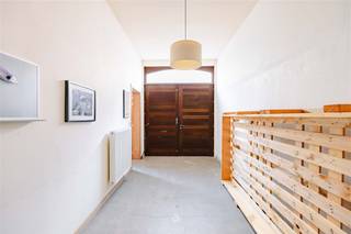 SINT-AMANDSBERG - Uniek pand met twee wooneenheden, binnenkoer en dakterras Aan de Herlegemstraat 3-5, op een boogscheut van Gent-Dampoort en het...