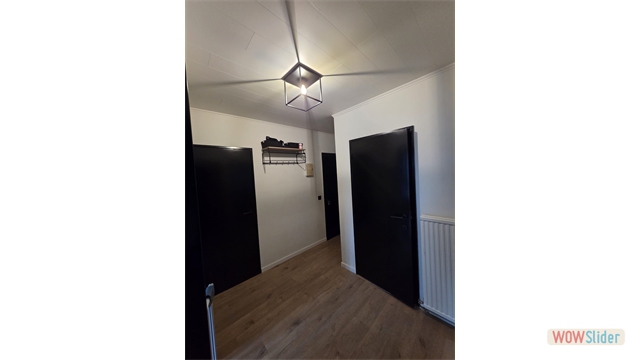 Een mooi afgewerkt appartement op de tweede verdieping in het centrum van Oostmalle - foto 3