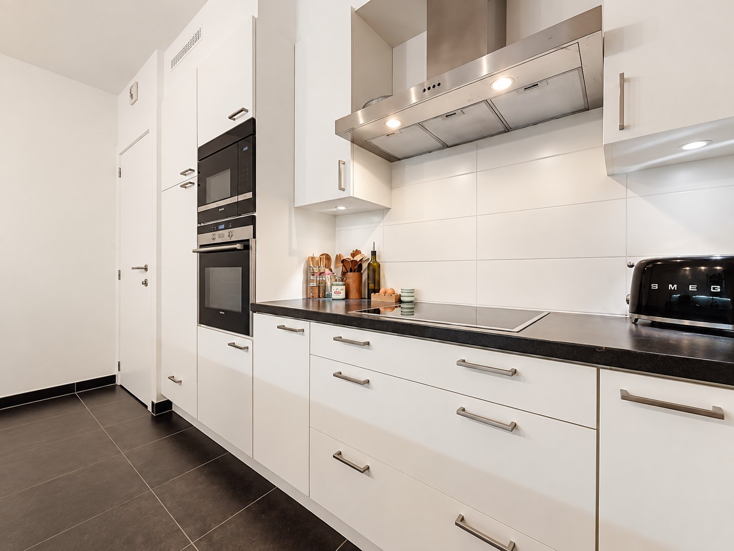 Jouw nieuwe thuis nabij Antwerpen: lichtrijk 2-slaapkamerappartement met zonnig terras & staanplaats - foto 5