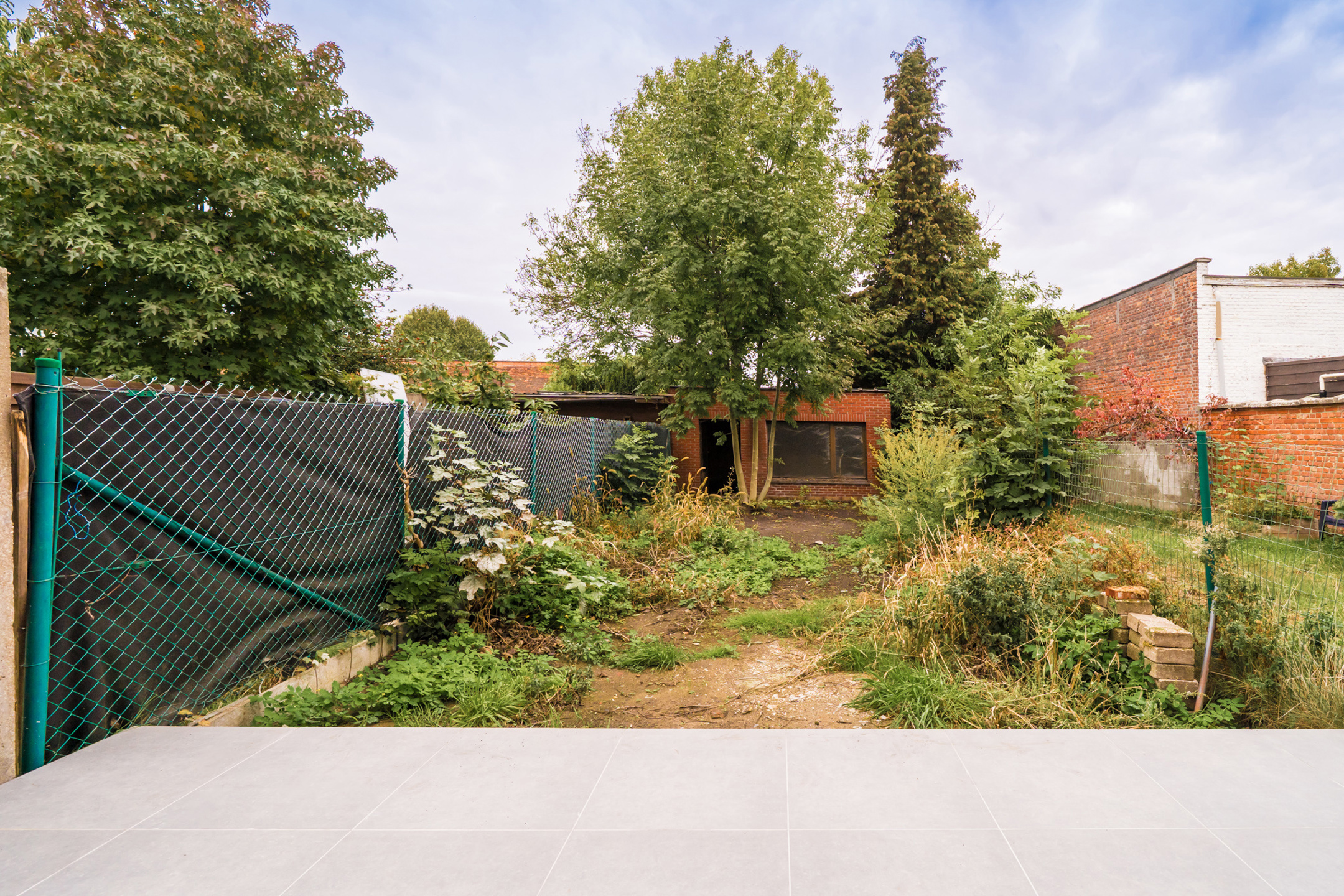 Modern gelijkvloers appartement met tuin - foto 2