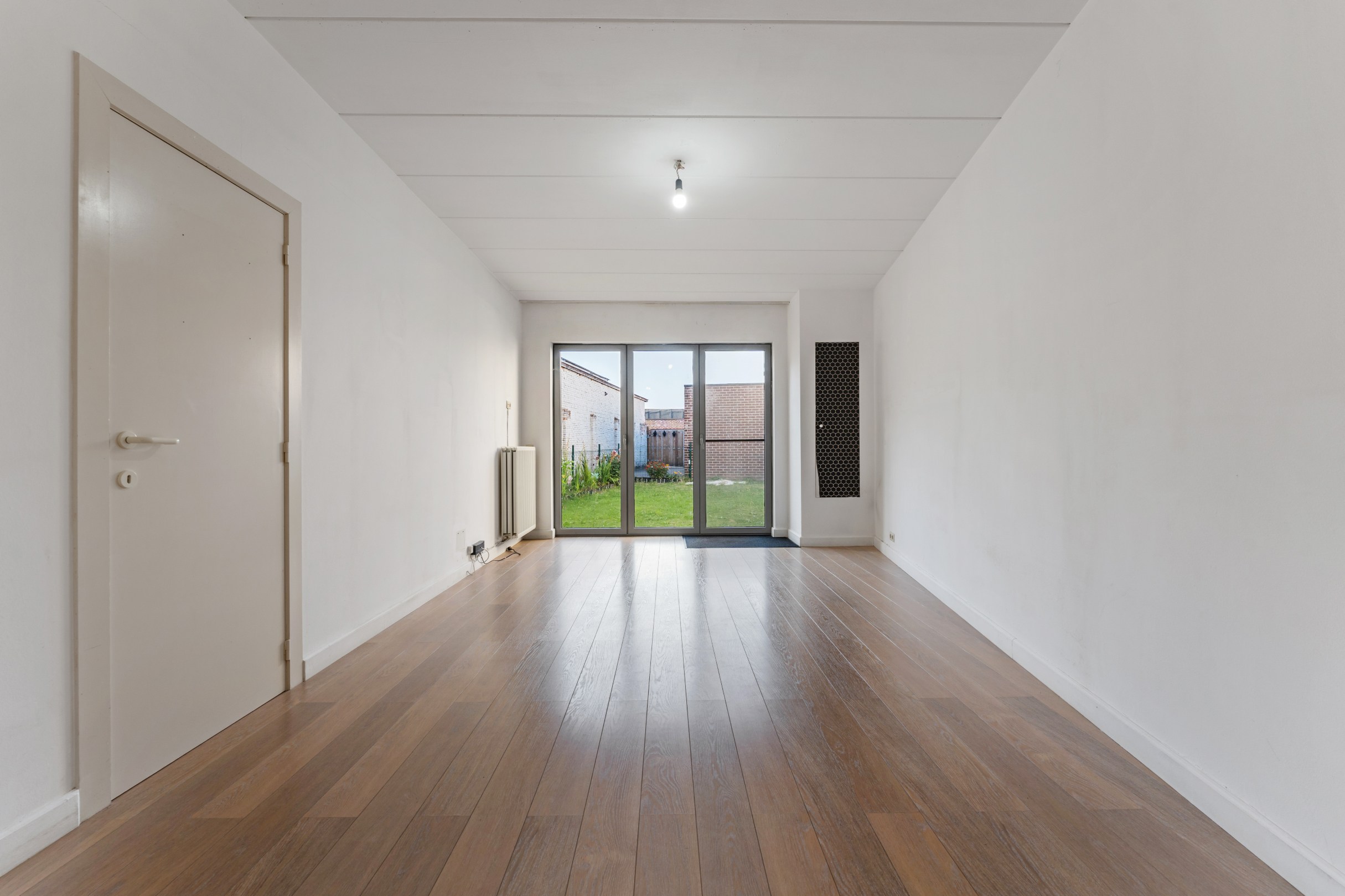 Gelijkvloers appartement met 1 à 2 slaapkamers, tuintje en garagebox - foto 4