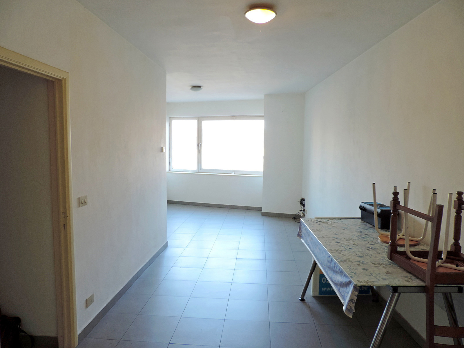 Opbrengsteigendom met handelsgelijkvloers en 2 appartementen - foto 4