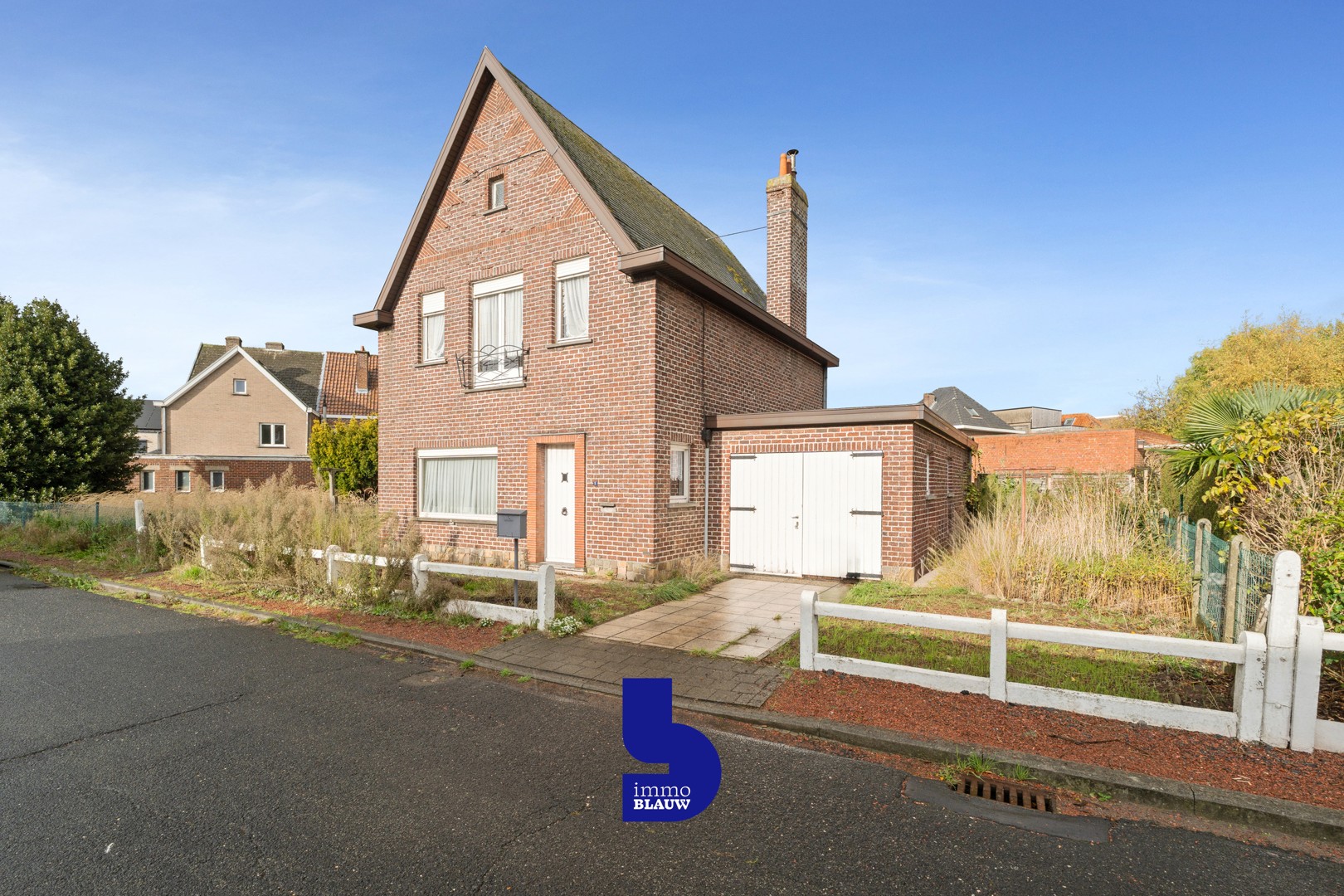 Open bebouwing met tuin en garage - foto 1