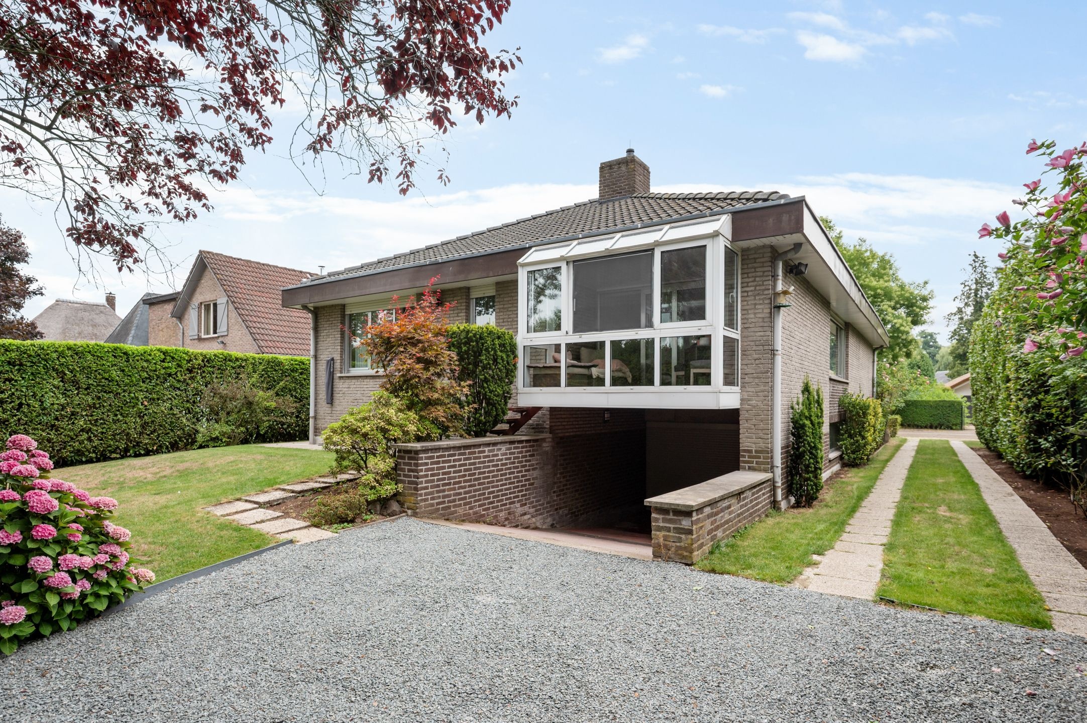 Royale laagbouwwoning met riante leefruimte en grote kelder op toplocatie in De Sterre! - foto 3