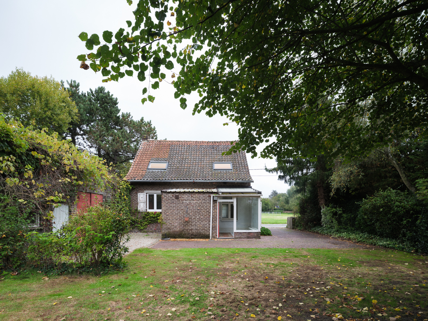 Vrijstaande woning met ruime bijbouw en veelzijdige mogelijkheden in Drongen - foto 4