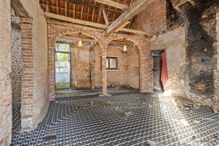 <p><span>Farmhouse to renovate in quiet location in Meerhout between the fields</span></p><p><span>Looking for a unique project in a rural, quiet setting? This authentic farmstead in Meerhout offers you the opportunity to create your dream home completely to your own taste.</span></p><p><span>The farmhouse is located on a plot of </span><span>8a 92ca</span><span> and enjoys a beautiful view over the surrounding fields, providing tranquility and privacy. The property has already been partially gutted by the current owner, allowing a renovation project to start immediately. This offers an excellent opportunity for those who want to keep the charm of a farmstead while adding modernization and personal touches.</span></p><p><span>An added bonus: there is the possibility to </span><span>purchase additional land</span><span>, giving you even more space for garden, vegetable garden, outbuildings or other possibilities to your liking.</span></p><p><span>Thanks to its location, you combine the comfort of rural tranquility with proximity to amenities and connecting roads. A perfect opportunity for those who want to get creative and realize a custom home with a rural character. </span></p>