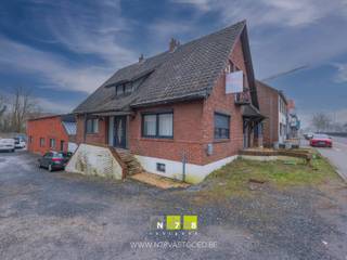 VRIJSTAANDE WONING MET 5 SLAAPKAMERS EN LOODS (132m²) OP EEN PERCEEL VAN 10A69CA TE MAASMECHELENTROEVEN- Commerciële Top-ligging! Gelegen langs de...