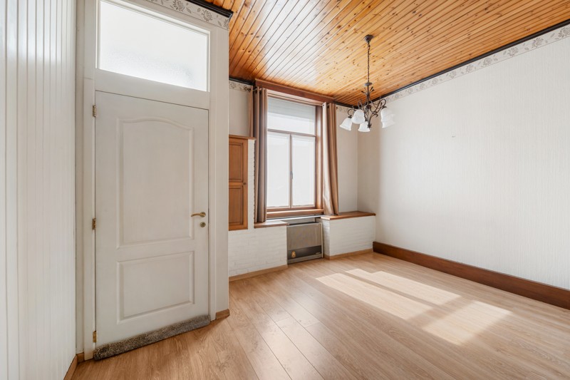 Betaalbare rijwoning met tuin en renovatiepotentieel op gunstige ligging in Kortrijk - foto 4