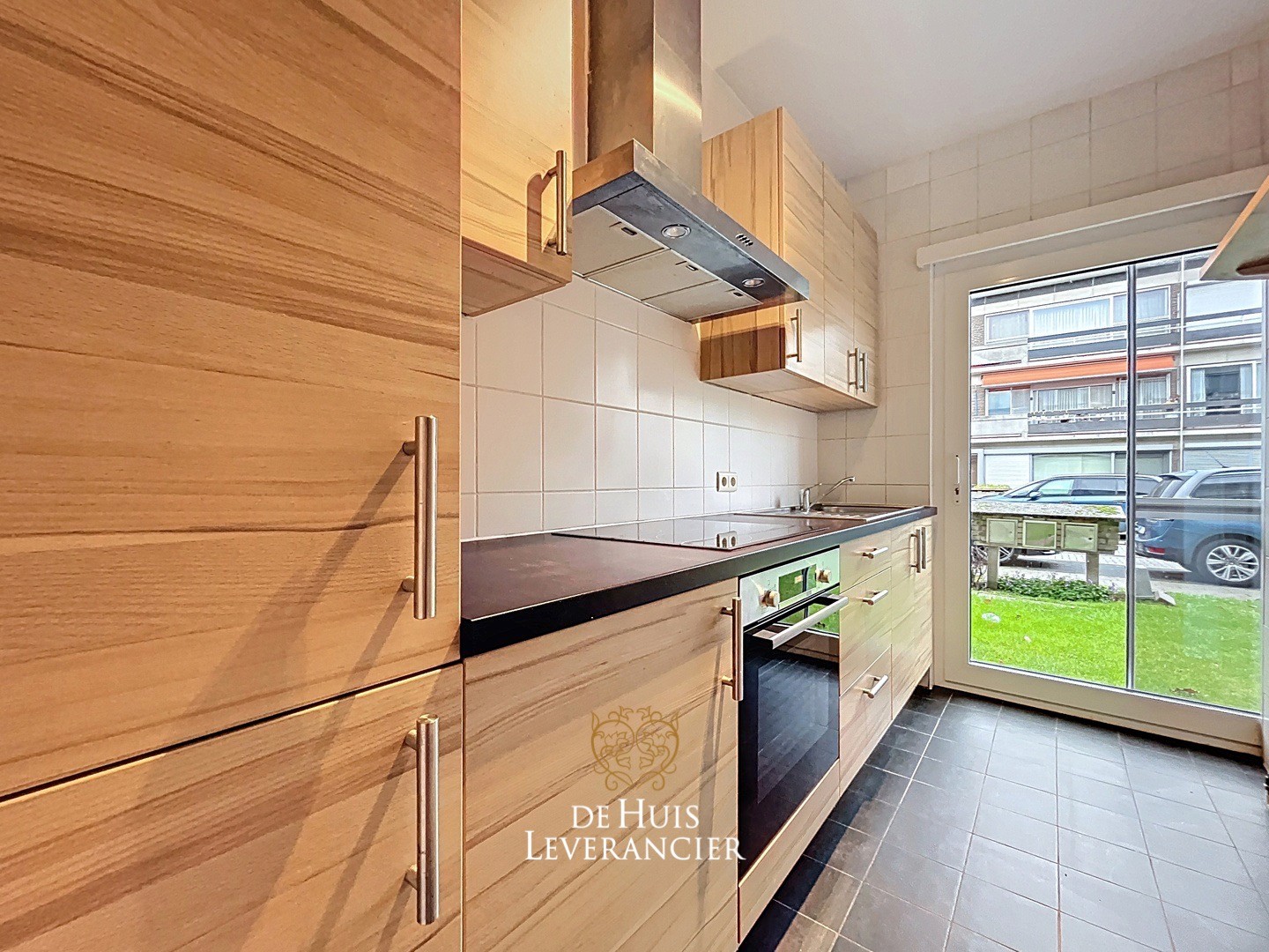 Gezellig gelijkvloers appartement met 2 slpk inclusief garage te huur in Kontich - photo 3