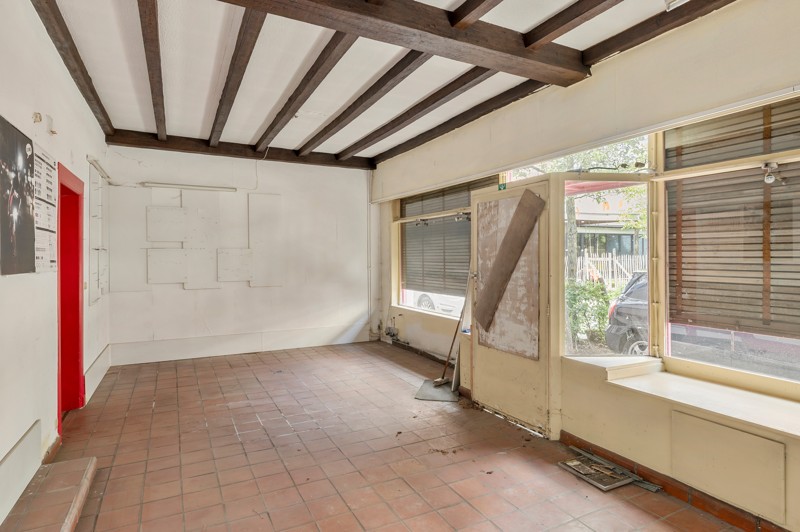 Woonhuis met commerciële ruimte en tuin - foto 4