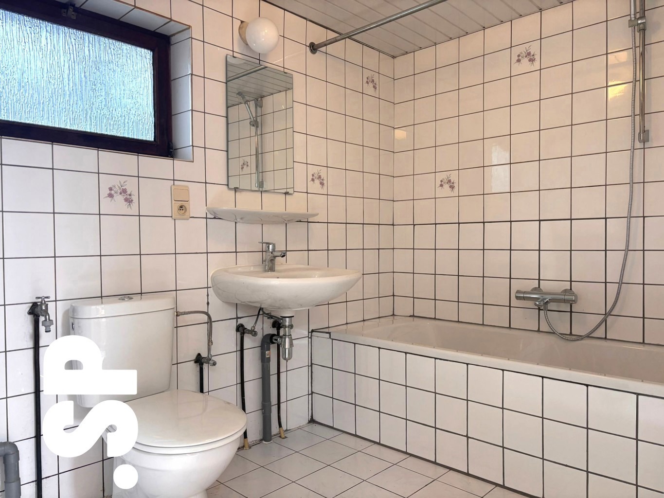 Opgefriste woning met 2 slaapkamers, ruime omheinde tuin en garage te Zoerle-Parwijs. - foto 5