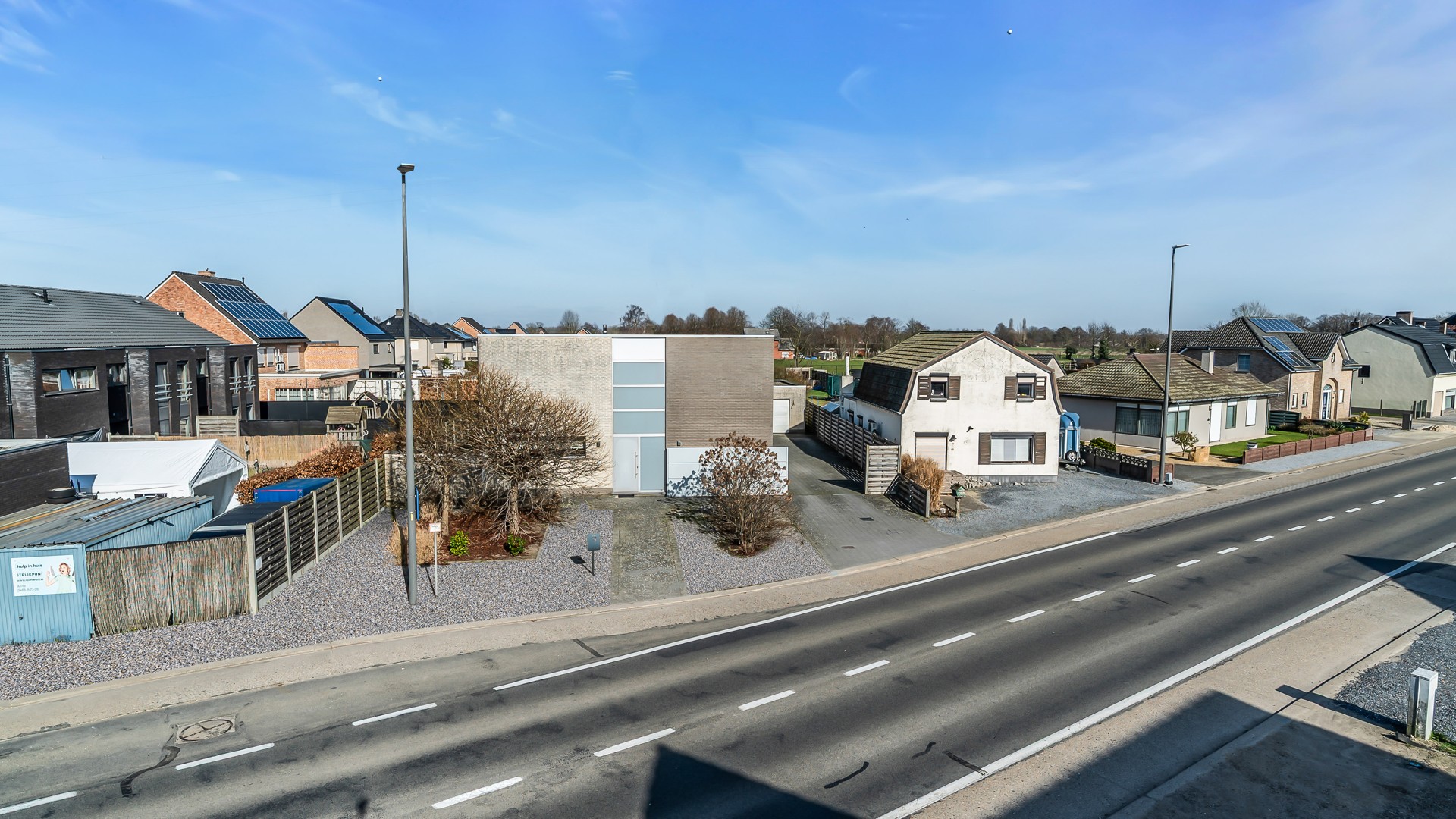 Trendy gezinswoning met open leefruimte, 4 slaapkamers en vrijstaande garage - foto 2