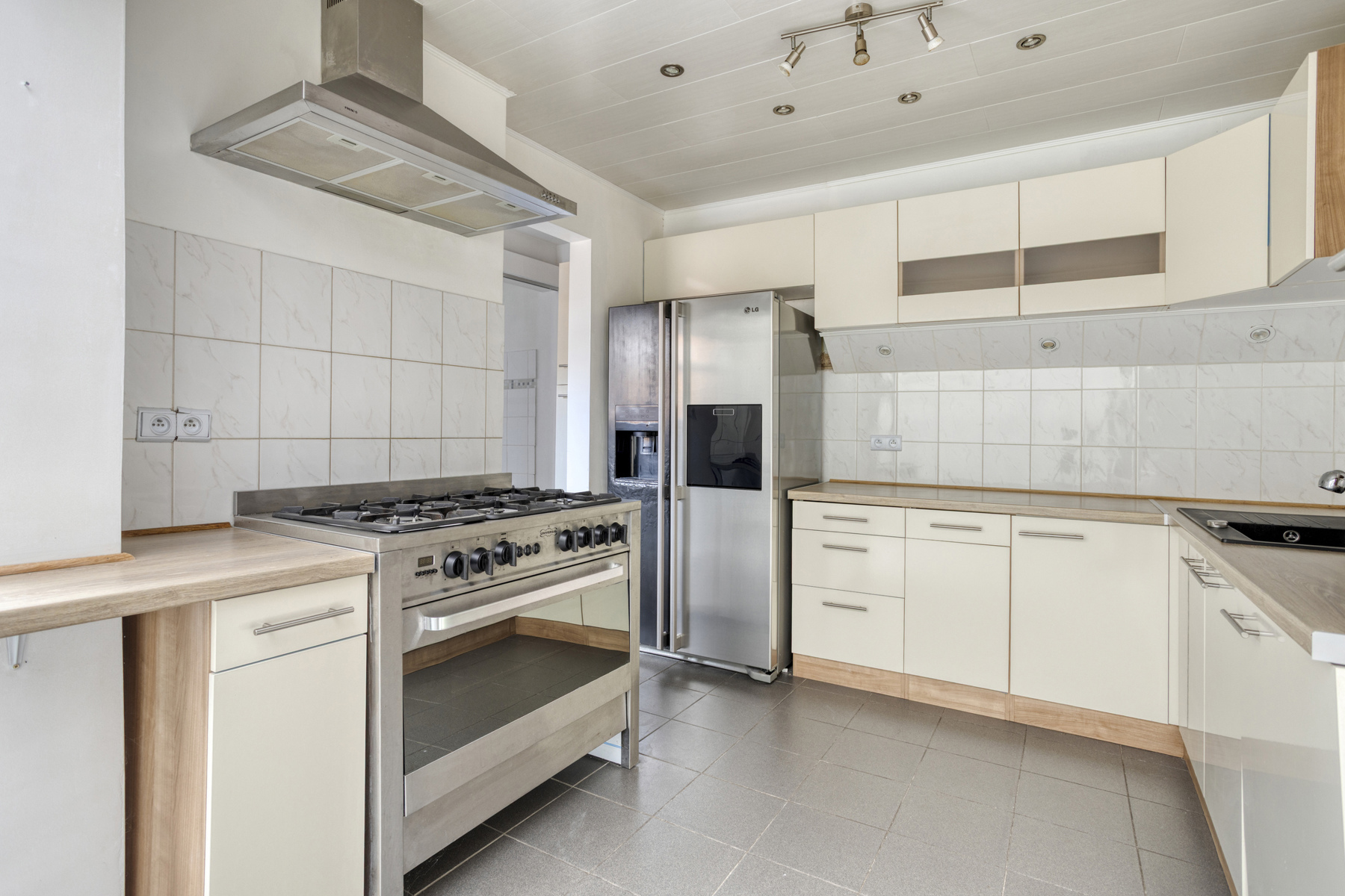 Instapklare woning met tuin en garage ! - foto 3