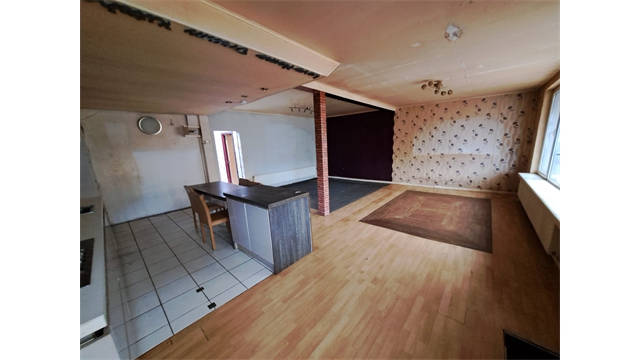 Een te renoveren woning met ruime tuin - foto 5