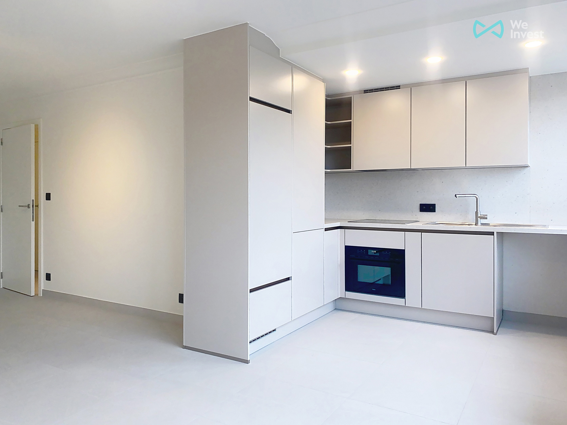 Volledig gerenoveerd 2-slaapkamerappartement met garage - foto 5