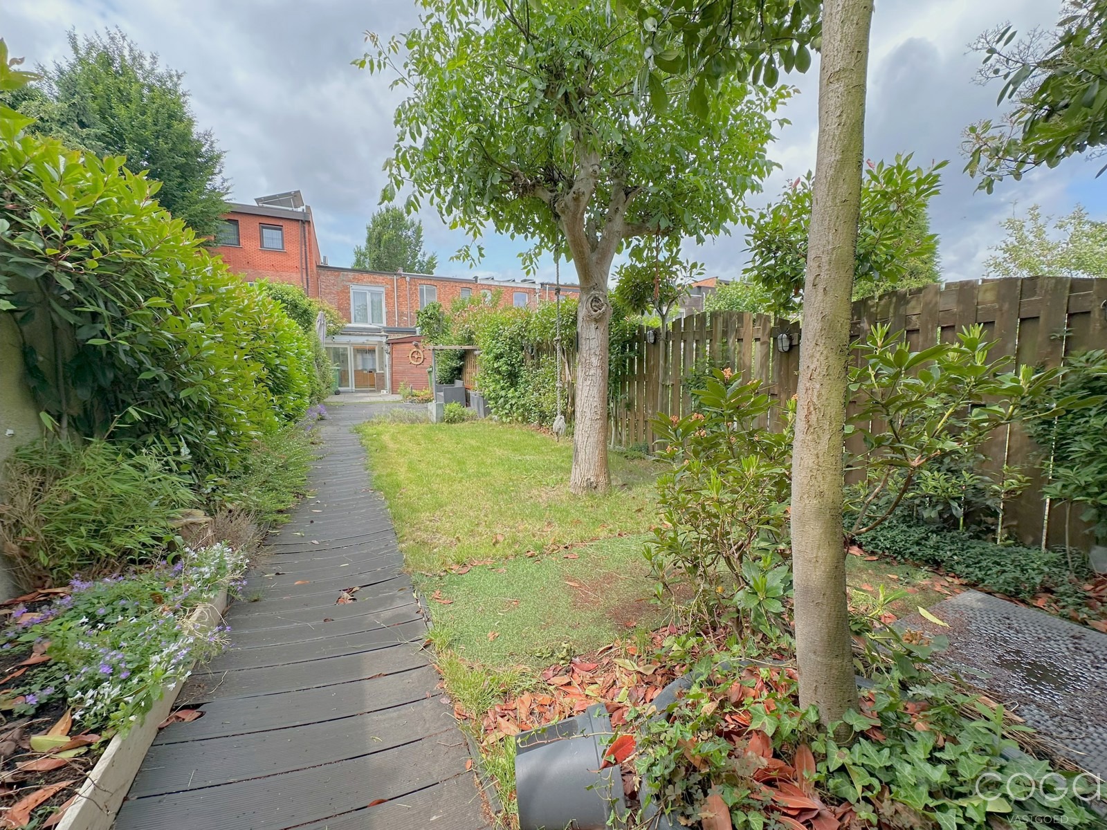 Charmante woning met diepe tuin in het hart van Merksem - foto 3