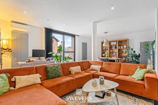 Interesse? Meer informatie op www.SWEVERS.be. - Dit appartement of eerder instapklare bel-etage woning aan de G. Gezellelaan 81/11 in...