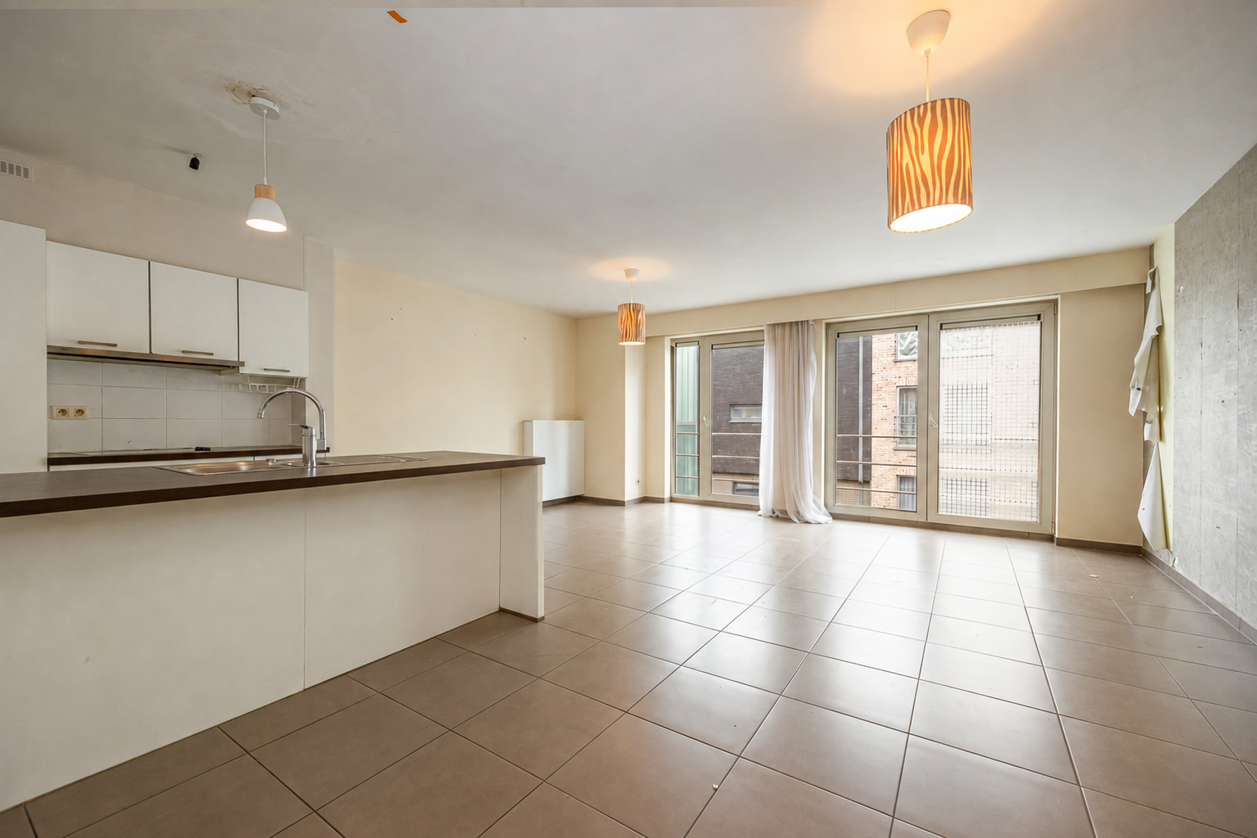 Verzorgd appartement met 2 slaapkamers en overdekt terras - foto 4
