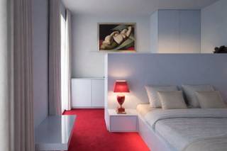 Imposant designappartement met loftallures nabij het Wintercircus en De Krook Dit uitzonderlijke appartement, in een vorig leven nog een discotheek...