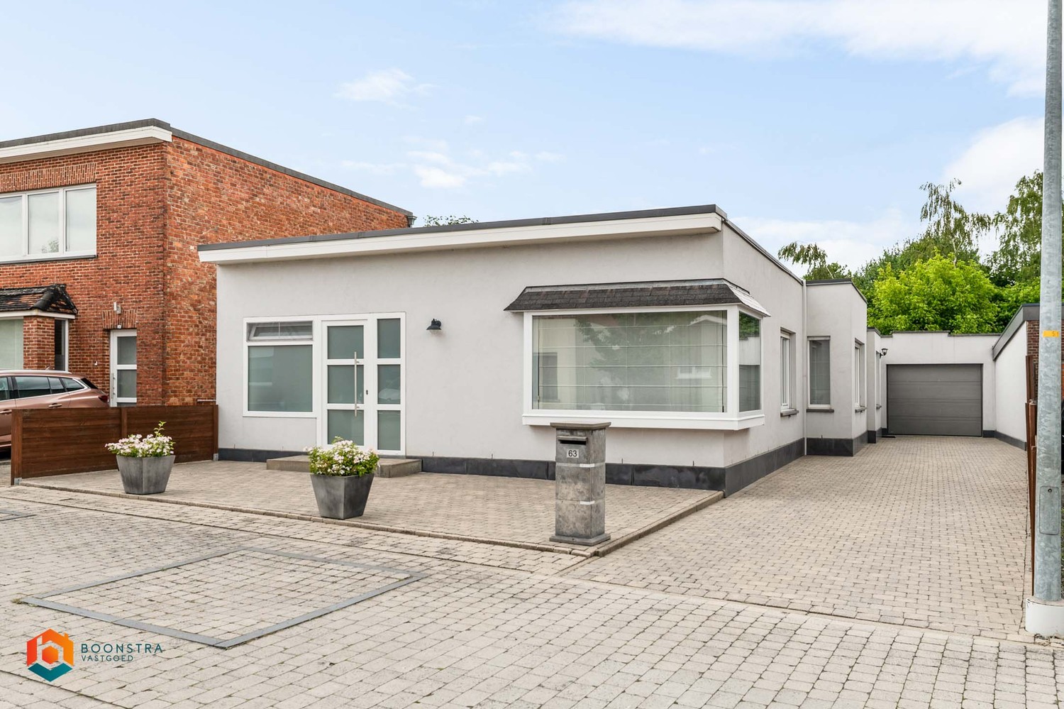 Zeer verzorgde laagbouwwoning met 2 slpkrs en leuke tuin - foto 1
