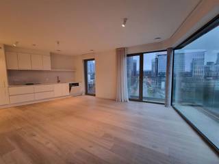 BRUSSEL, in de recente residentie RIVA, tegenover Tour & Taxi en vlakbij het Noordstation, prachtig appartement met 2 slaapkamers van ±90m²...