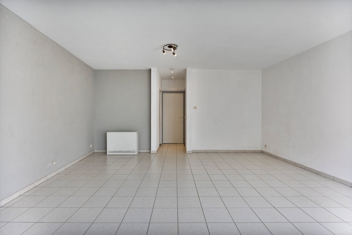 Instapklaar gelijkvloers appartement met gemeenschappelijke tuin en fietsenberging in hartje Kapellen! - foto 5
