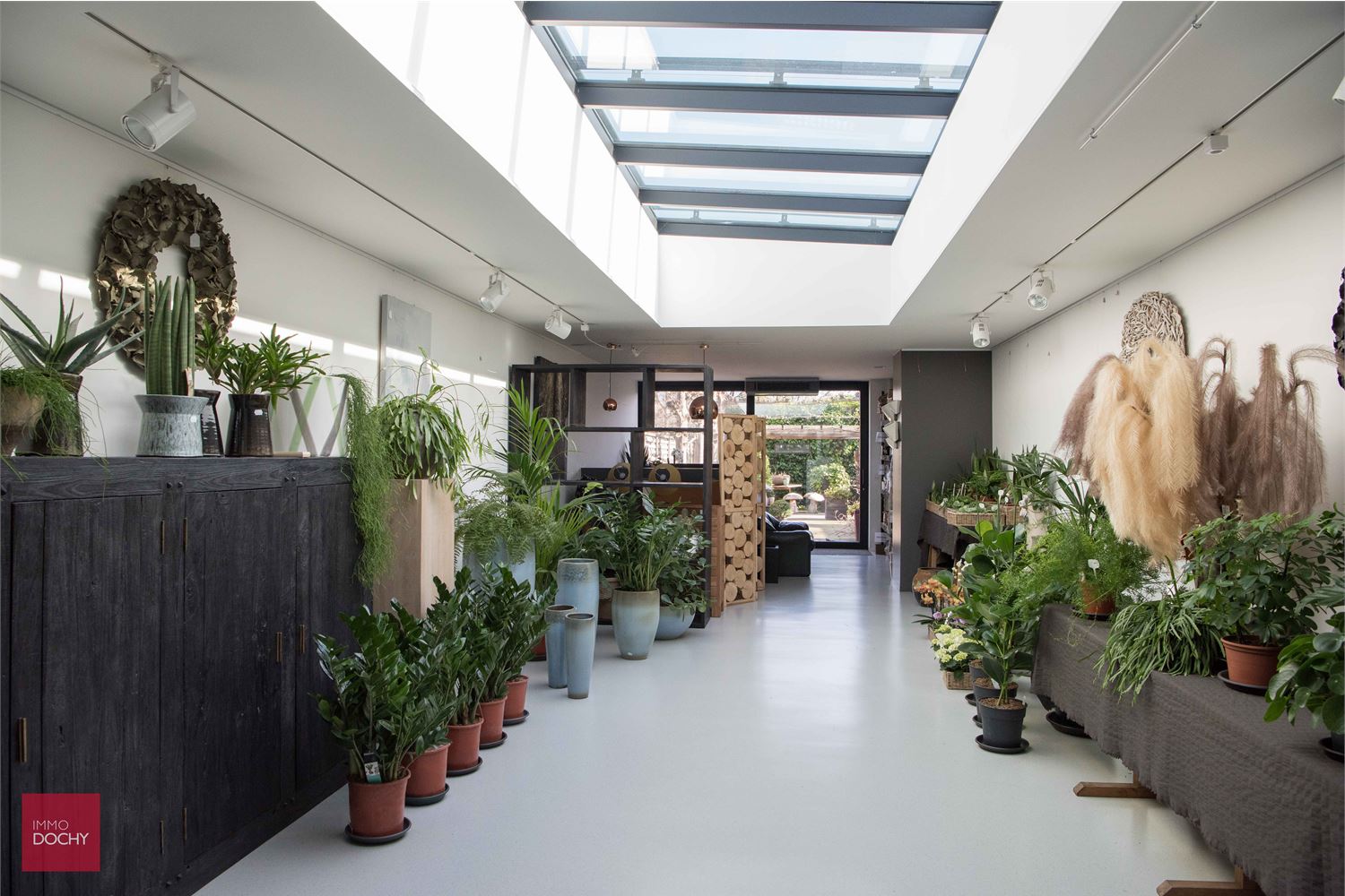 Zeer goed gelegen handelshuis met woonst en grond - foto 4