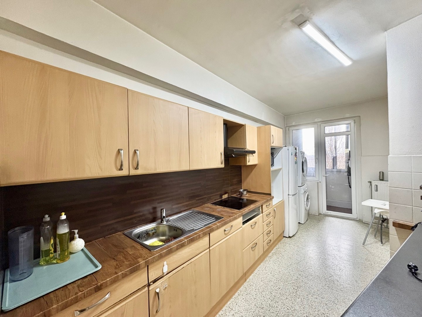 Te renoveren ruim 2-slpk appartement met staanplaats en kelder - foto 4