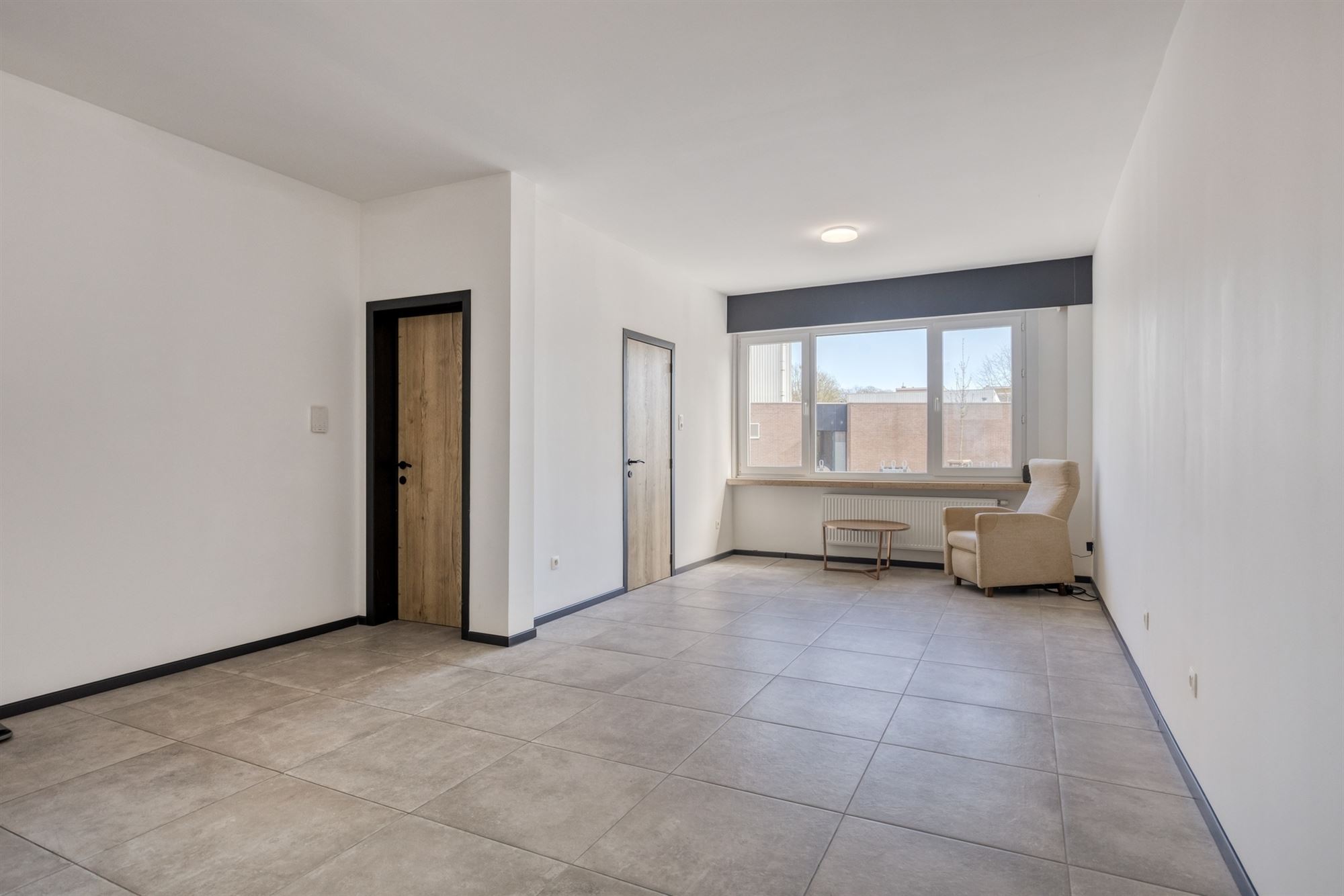 Ruime kangoeroe woning met 5 slk + 2 badk + terras in Lier - foto 2