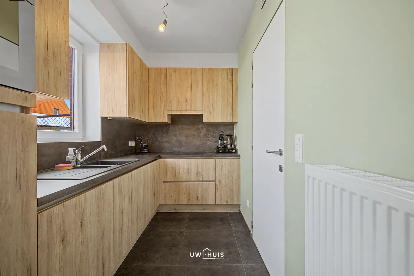 Recent gelijkvloers appartement met 2 slaapkamers, tuin, carport en staanplaats in Haasdonk - foto 5