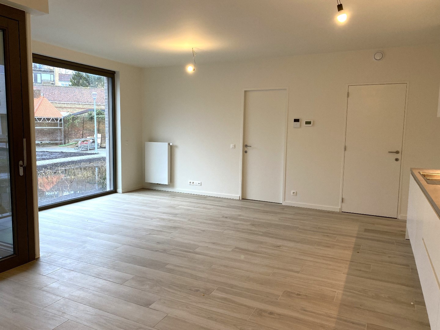 Luxueus gelijkvloers nieuwbouwappartement met 1 slaapkamer en autostaanplaats - foto 5