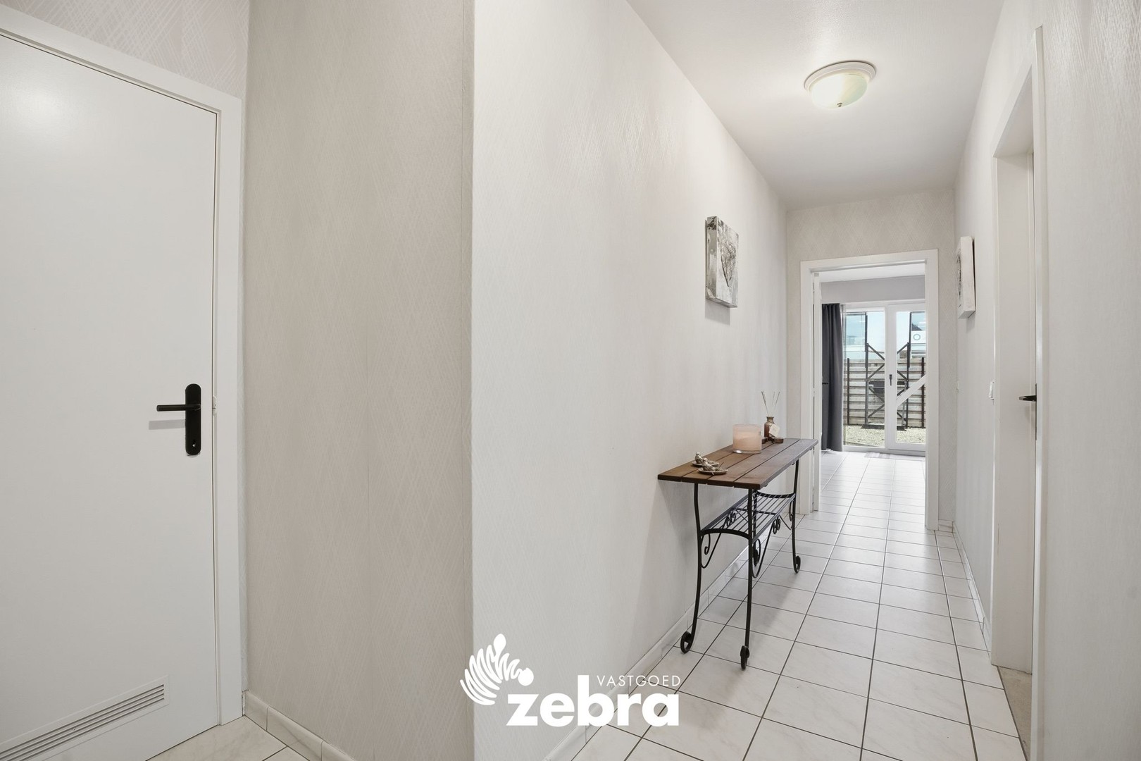 Instapklaar gelijkvloers appartement met tuin van 116 m² en garage! - foto 2