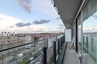 <p><span>Lambrechtshoekenlaan 211 (6th floor) - Merksem</span></p><p><span> </span></p><p><span>Apartment (80m²) with 1 bedroom and terrace (9 m²) in Merksem.</span></p><p><span> </span></p><p><span>In the Lambrechtshoekenlaan you live centrally and comfortably, with everything within easy reach. Thanks to the excellent accessibility by public transport, the velo-sharing system and the car, you get everywhere in no time. Moreover, you enjoy a wide range of stores, supermarkets and other amenities nearby.</span></p><p><span> </span></p><p><span>The apartment is located on the sixth floor of a well-maintained building with thirteen floors, the roof of which is conformably insulated. The fixed costs are €…/month and include water, heating (on gas with intermediate meters), block policy, trustee, elevator, reserve fund and the maintenance and electricity of the common parts.</span></p><p><span>You enter into a separate entrance hall with practical fitted wardrobe. From here you reach the spacious and bright living space with open, equipped kitchenette, together accounting for an area of approximately 40 m². Through a sliding door you have access to the spacious terrace of 9 m² with east orientation — ideal to start the day with the morning sun.</span></p><p><span>Furthermore, the apartment has a full bedroom of 15 m², a handy storage room (2 m²), a separate toilet and a bathroom (4 m²) equipped with a bathtub/shower and washbasin.</span></p><p><span>Are you looking for a comfortable apartment with spacious terrace and lots of light? Do not miss this opportunity! Habitable opp.80. m² – ref: gross floorp. For more info or a free estimate visit </span><span><span>www.hansimmo.be</span></span></p><p><span> </span></p>